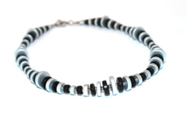 Handgemaakt collier met schijfjes op edelstaal