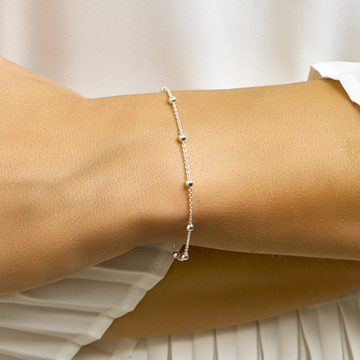 Armband anker en bolletjes zilver wit