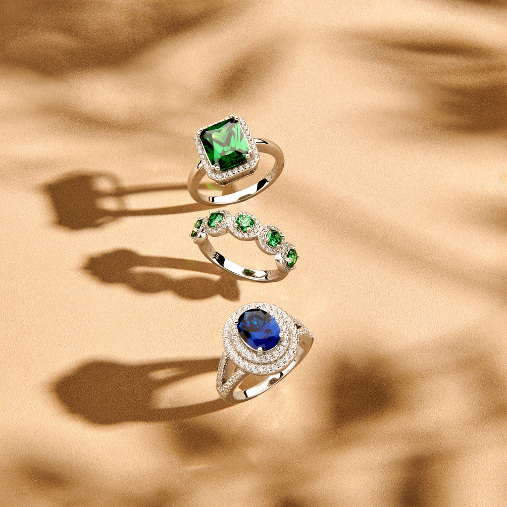 Ring saffierkleurig en wit zirkonia halo zilver gerhodineerd