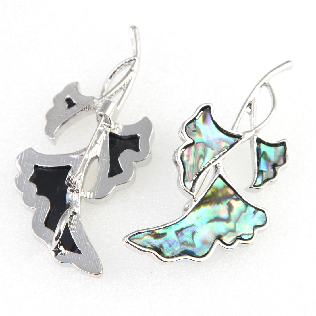 broche met parelmoer