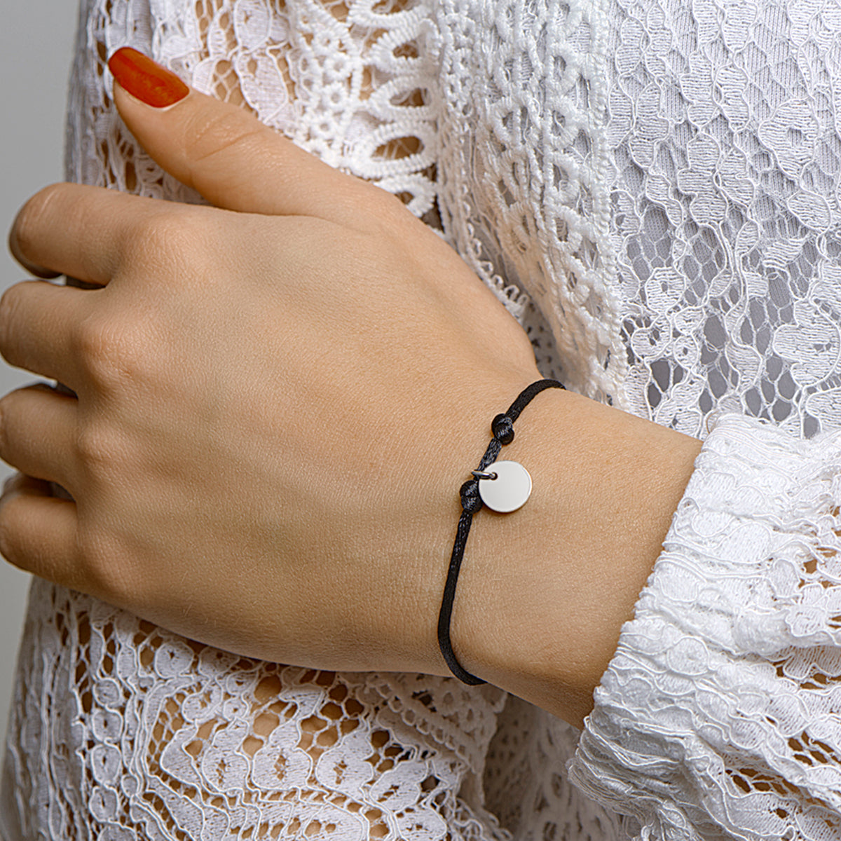 Armband satijn rondje zilver gerhodineerd met rubber/nylon/leer