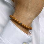 Kralenarmband lichtbruin hout 8,0 mm 19 - 26 cm zilver gerhodineerd met rubber/nylon/leer