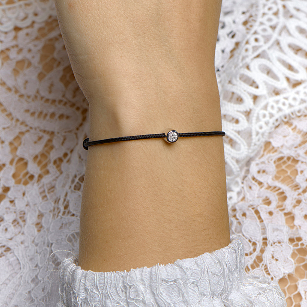 Armband katoen rondje zirkonia 15,5 + 2,5 cm zilver gerhodineerd met rubber/nylon/leer