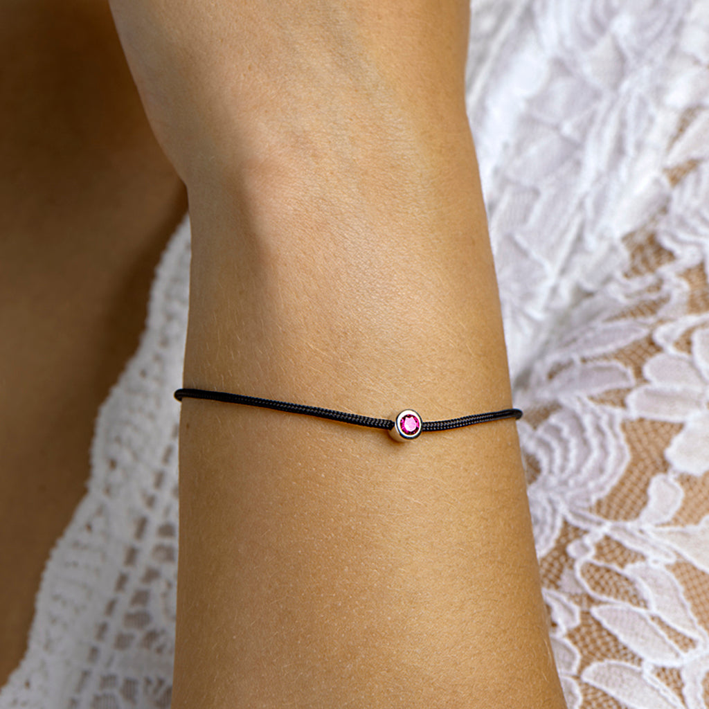 Armband katoen synth. robijn 15,5 + 2,5 cm zilver gerhodineerd met rubber/nylon/leer