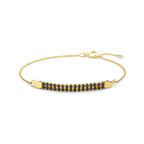 Armband schwarzer Spinell 16 - 18 cm 14K Gelbgold