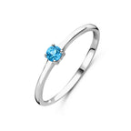Ring mit Geburtsstein Blautopas Dezember rhodiniertes Silber