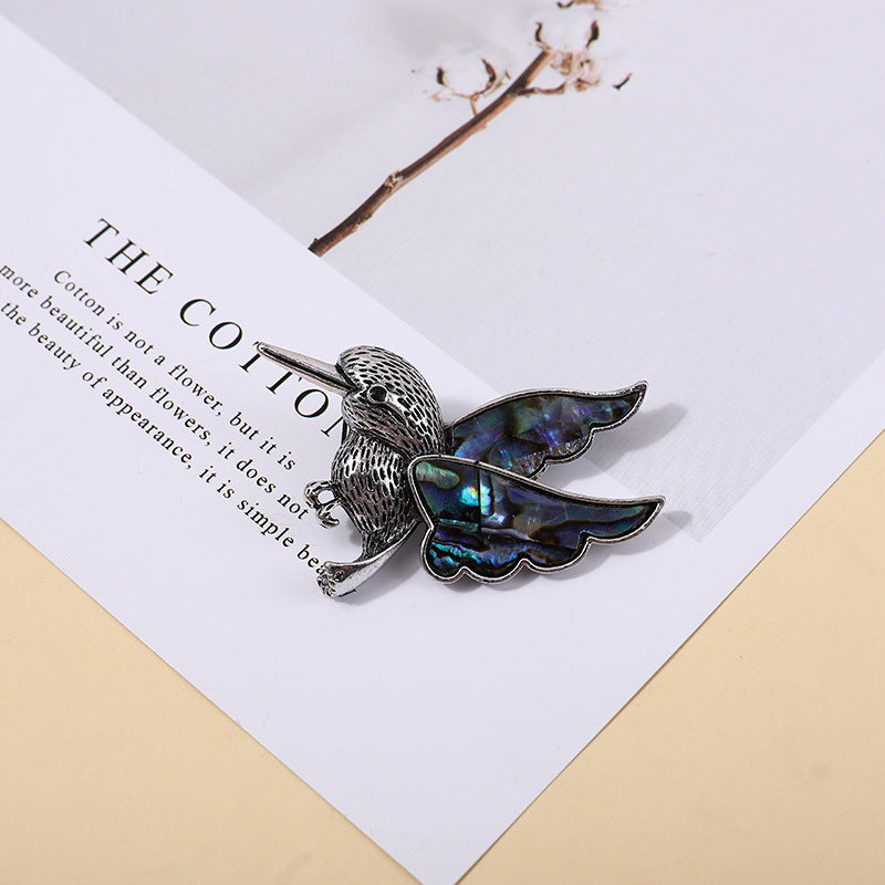 broche:kolibrie met parelmoer