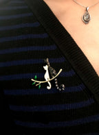 Broche katten zwart/wit emaille