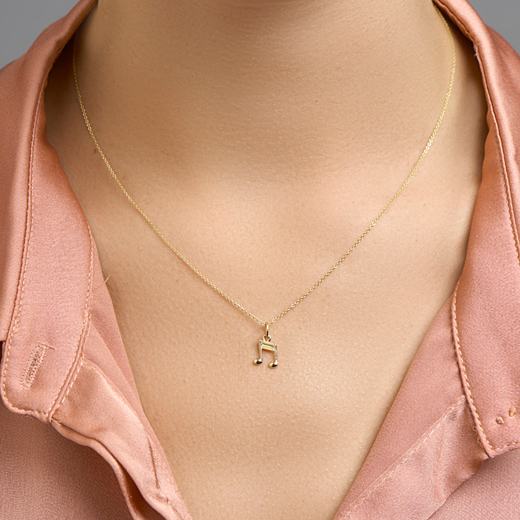 Hanger muzieknoot 14k geelgoud