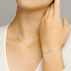 Armband rondjes 16,5 - 18,5 cm 14k geelgoud