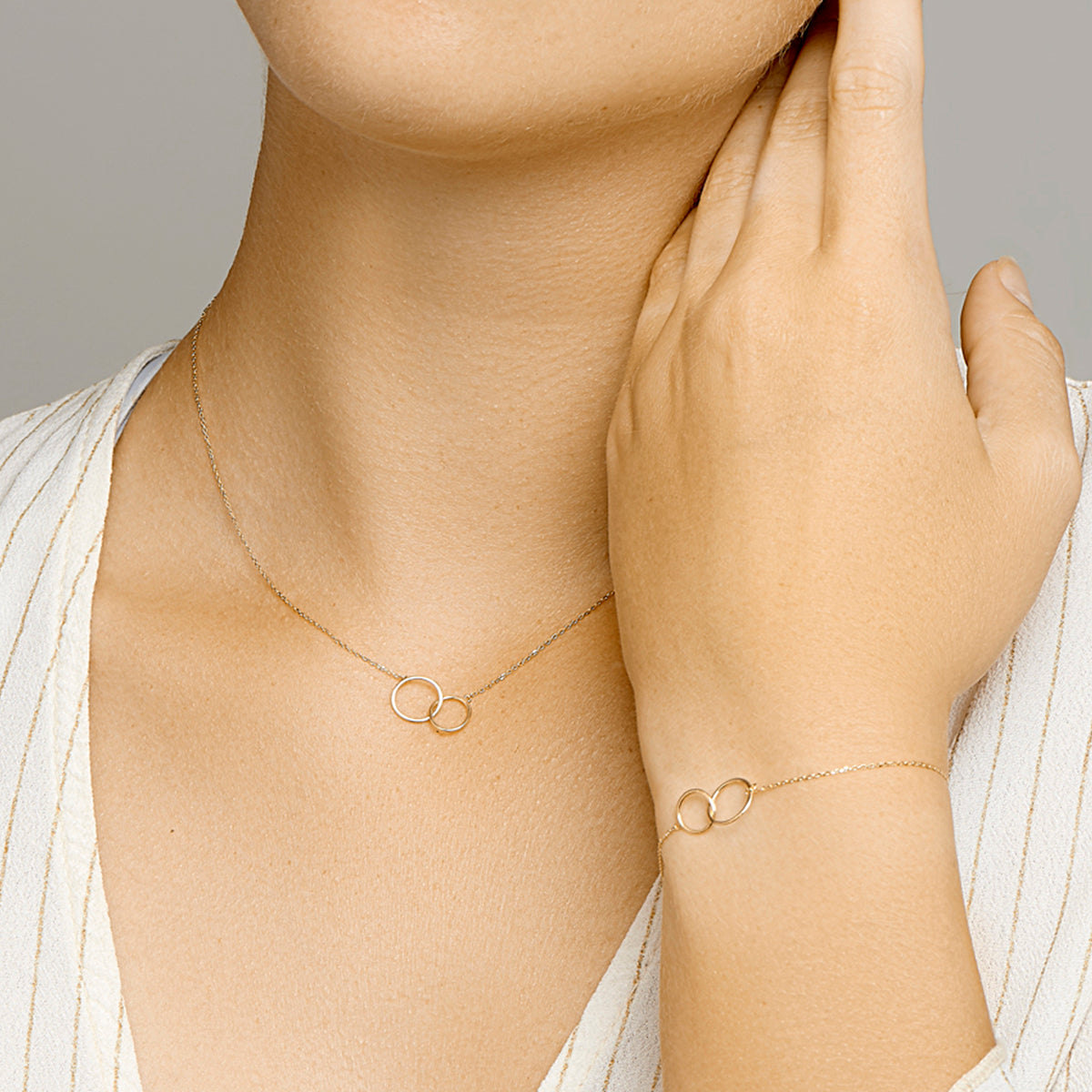 Armband rondjes 16,5 - 18,5 cm 14k geelgoud