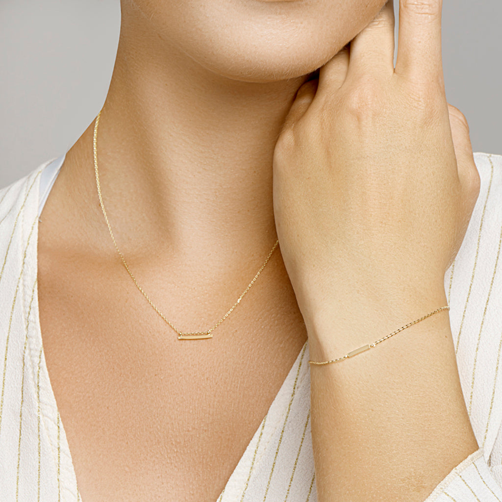 Armband balkje 16,5 - 18,5 cm 14k geelgoud