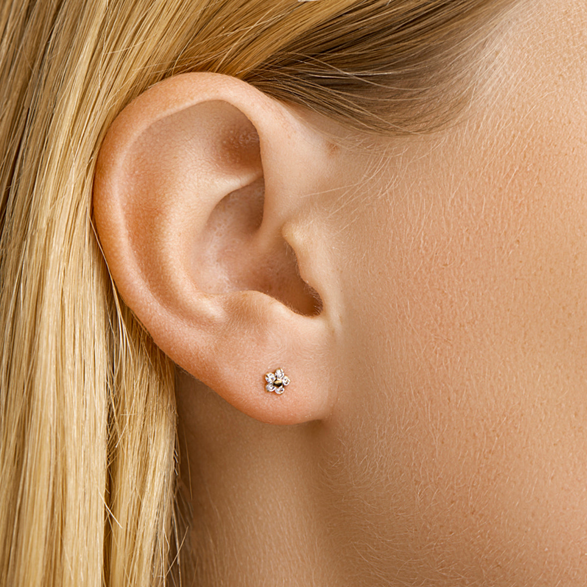 Oorknoppen bloem en zirkonia 14k geelgoud