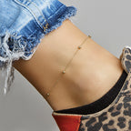 Enkelbandje bolletjes 1,0 mm 24 - 26 cm 14k geelgoud