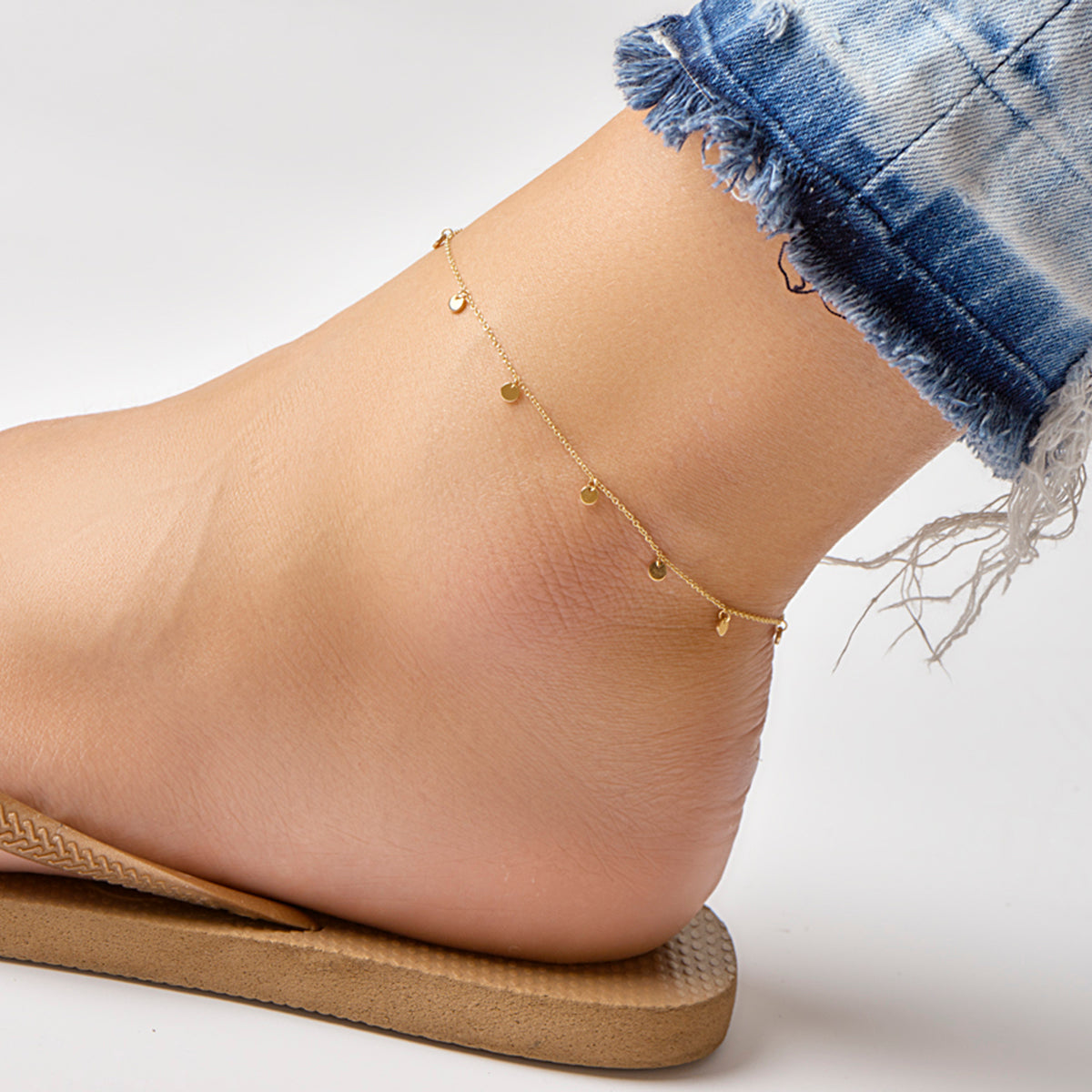 Enkelbandje rondjes 24 - 26 cm 14k geelgoud