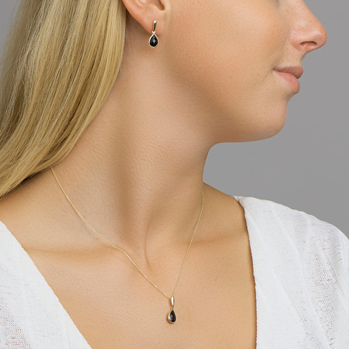 Hanger onyx 14k geelgoud