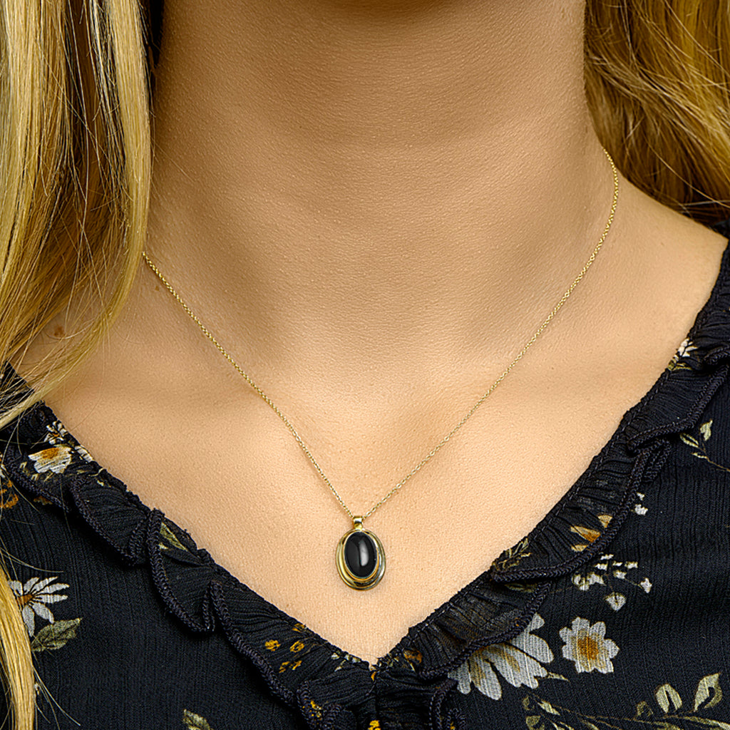 Hanger onyx 14k geelgoud