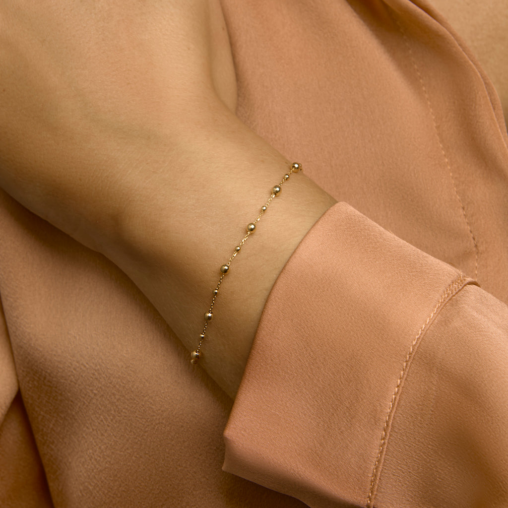 Armband bolletjes 0,8 mm 16,5 - 18,5 cm 14k geelgoud
