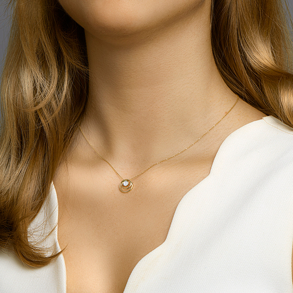 Hanger rond diamant 0.03ct h si bicolor gestift 14k geelgoud