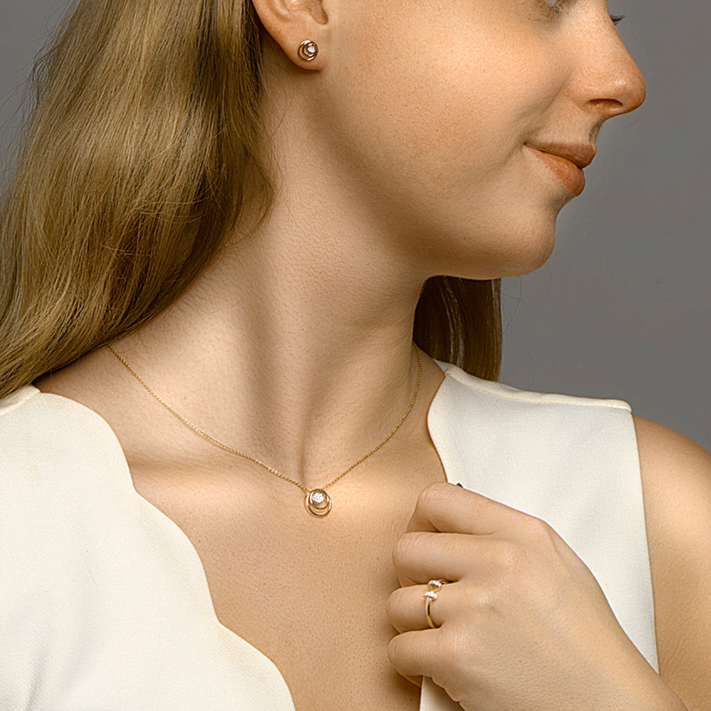 Hanger rond diamant 0.03ct h si bicolor gestift 14k geelgoud