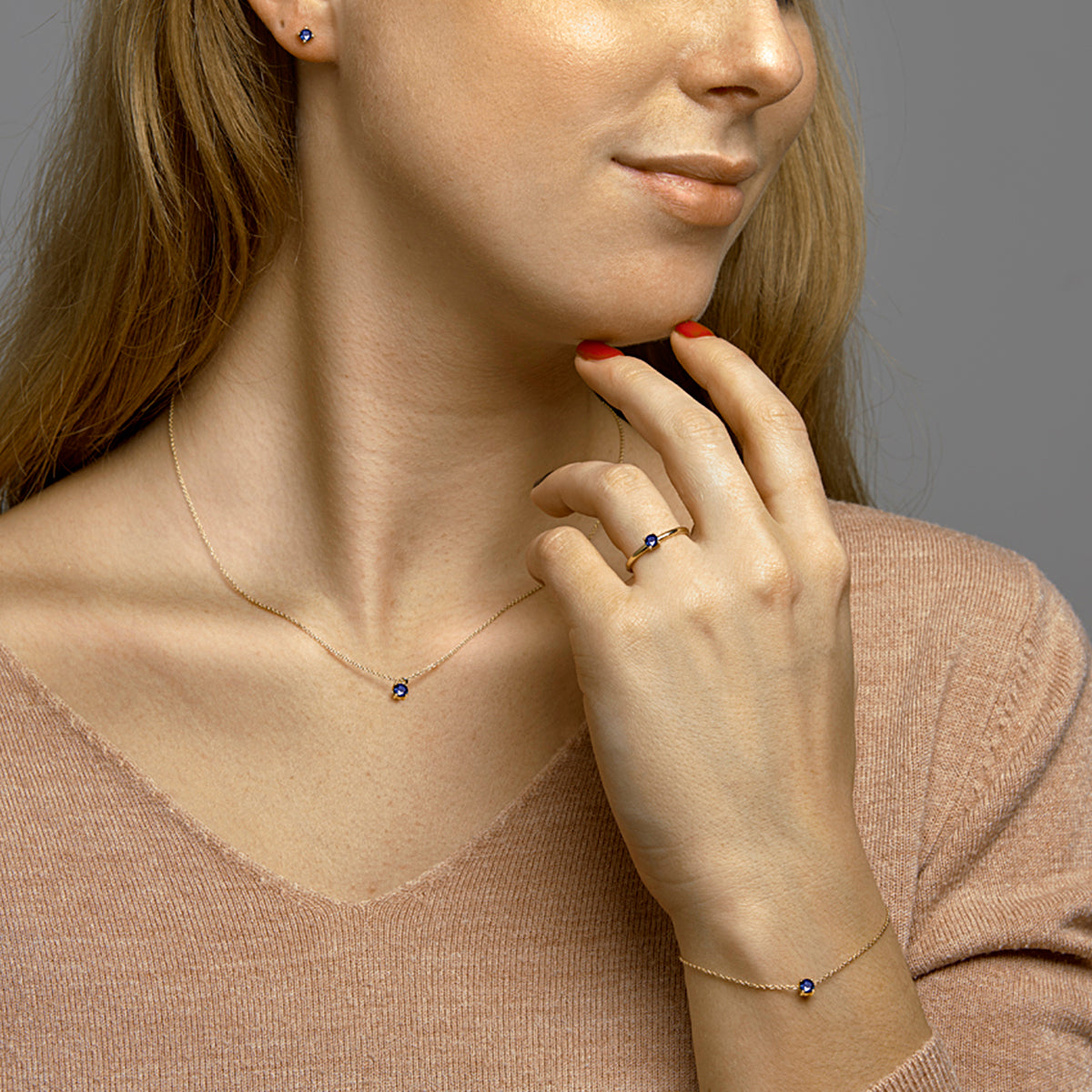 Oorknoppen saffier 14k geelgoud