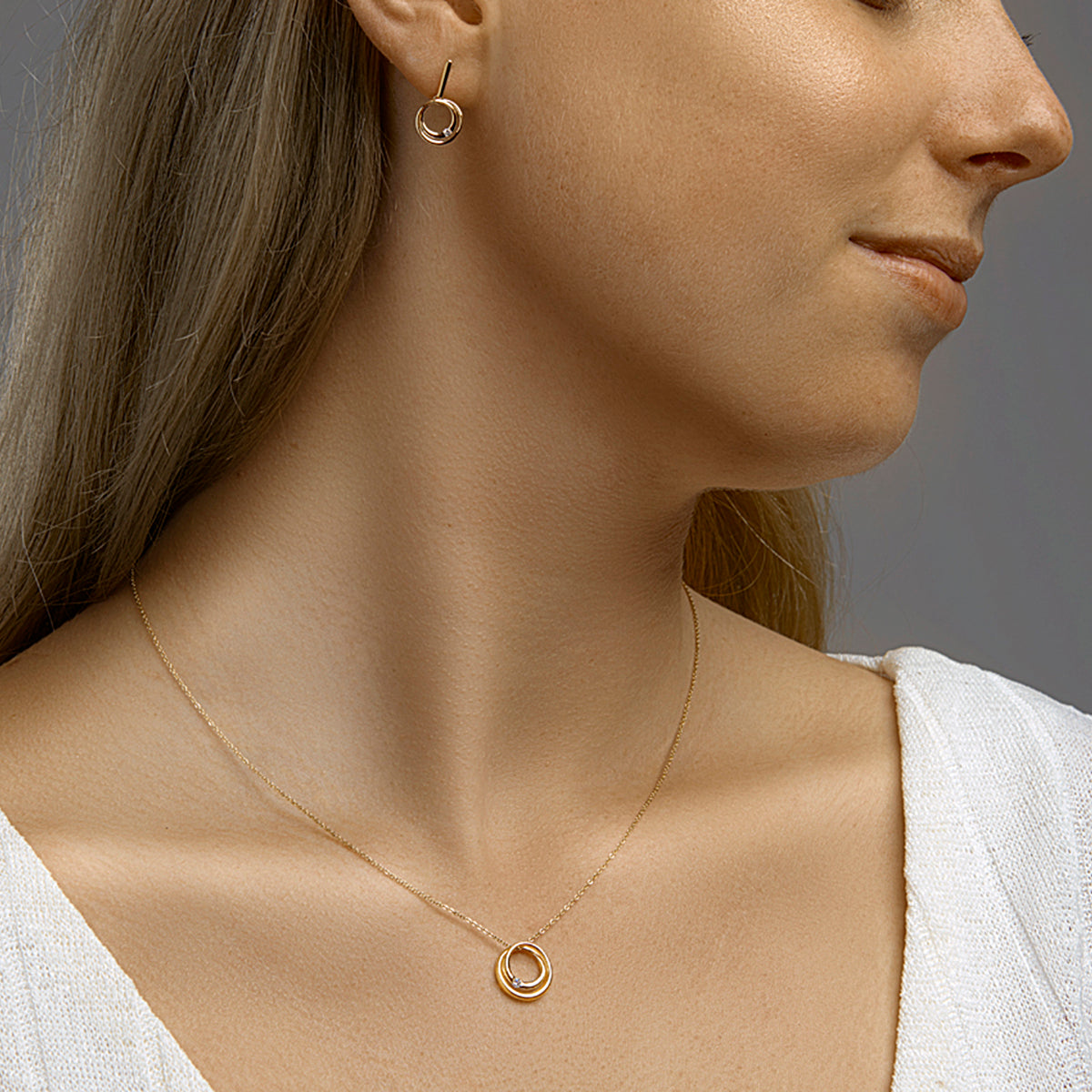 Hanger rond diamant 0.04ct h si 14k geelgoud