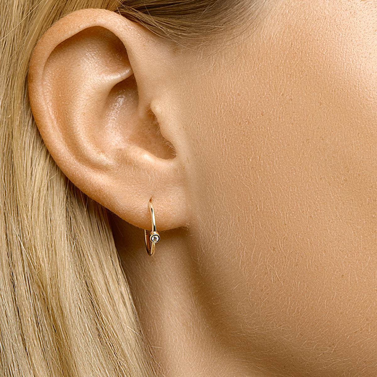 Stekeroorringen zirkonia 14k geelgoud