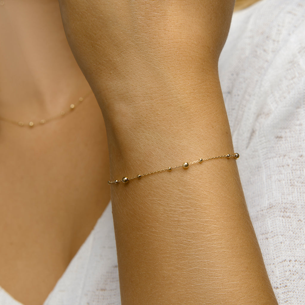 Armband bolletjes 0,8 mm 16,5 - 18,5 cm 14k geelgoud