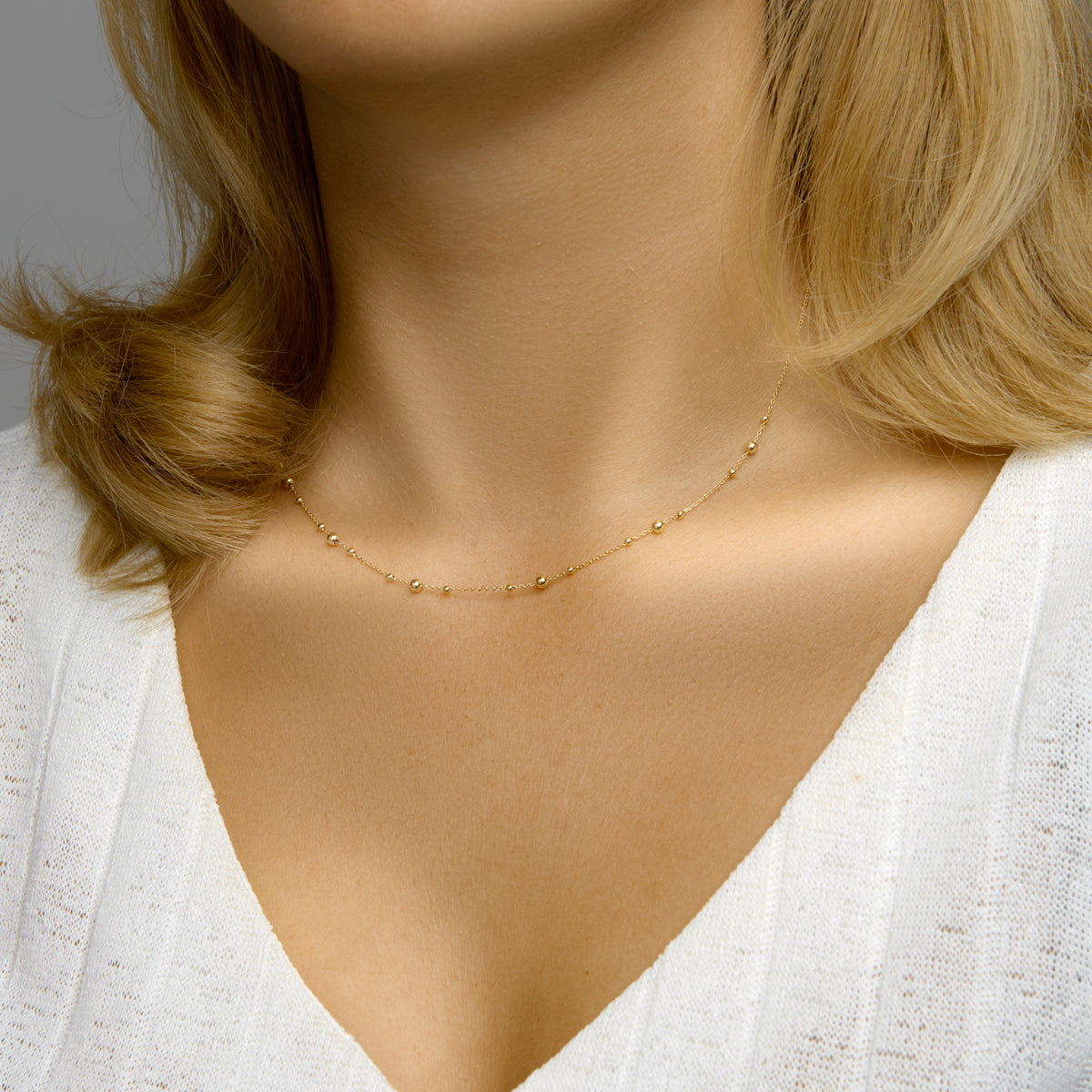 Collier bolletjes 0,8 mm 41 + 4 cm 14k geelgoud