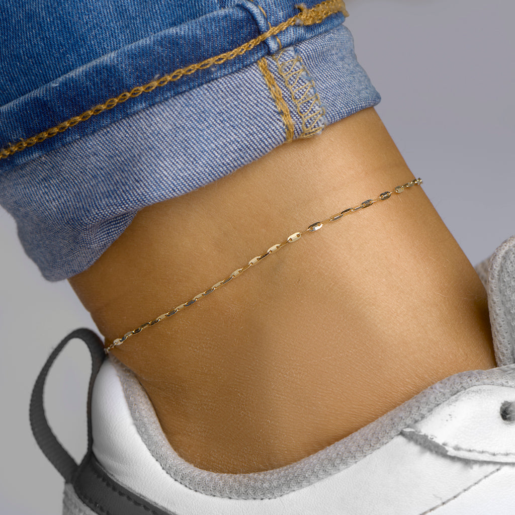 Enkelbandje plaatjes 1,5 mm 24 - 26 cm 14k geelgoud