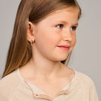 Klapoorringen 1,5 mm halfronde buis 14k geelgoud