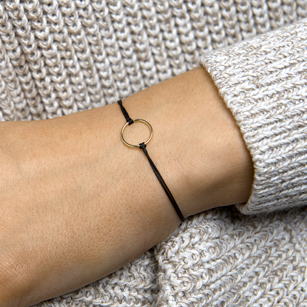 Armband katoen rondje 13 - 19 cm 14k goud met rubber/nylon/leer