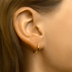 Oorringen vierkante buis 1,6 mm zilgold (geelgoud met zilverkern)