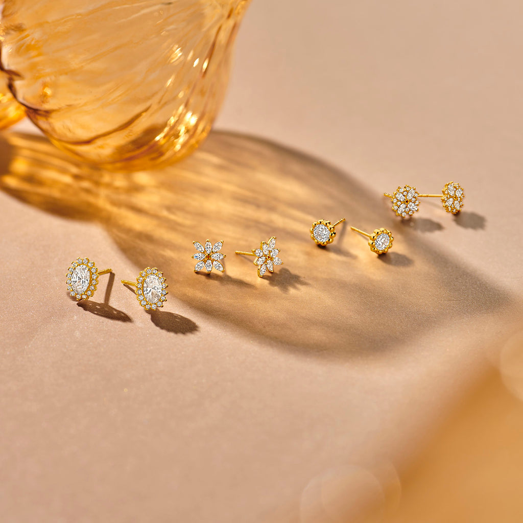 oorknoppen zirkonia 7 mm 14K geelgoud