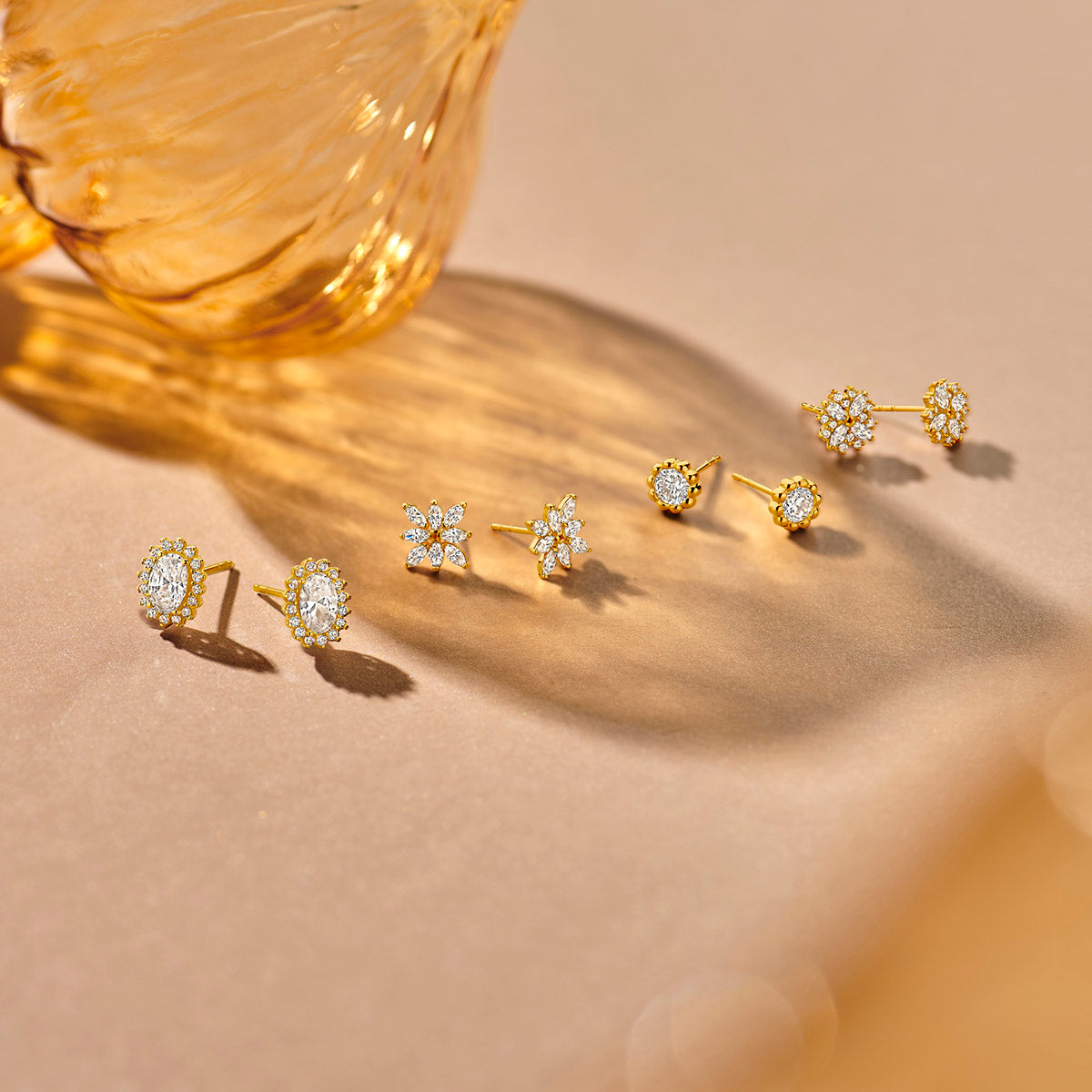 oorknoppen zirkonia 7 mm 14K geelgoud