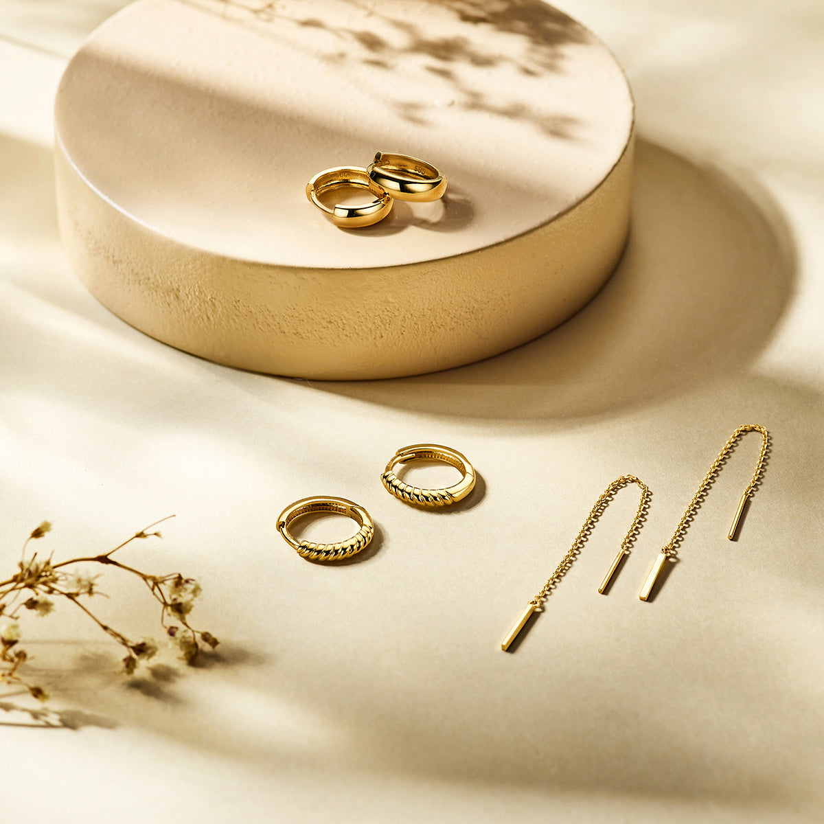 klapoorringen 12 mm 14K geelgoud