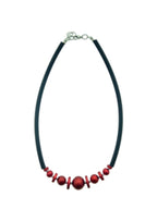 collier met bollen en schijfjes