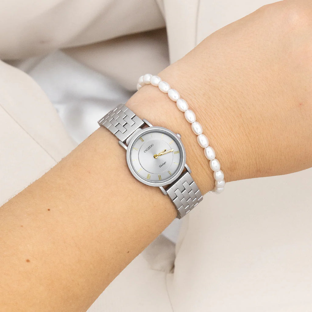 Licht grijze horloge met licht grijze roestvrijstalen band