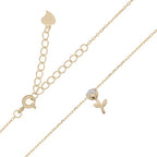 vergulde ketting met bloem en pareltje