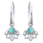 zilveren oorringen met een bedeltje: lotus met turkoois